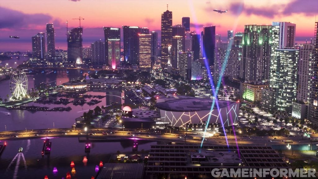 Vice City al anochecer. El perfil urbano, el puerto y los reflejos de las luces dibujan una panorámica nocturna de la ciudad.